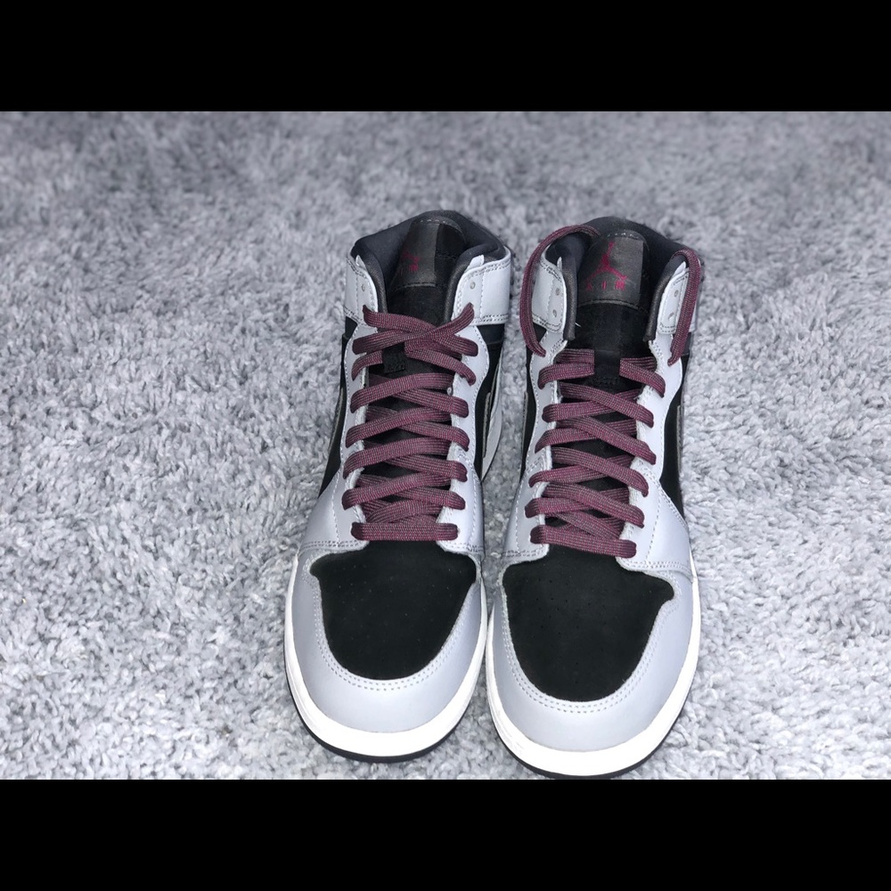 Black and purple Air Jordan’s